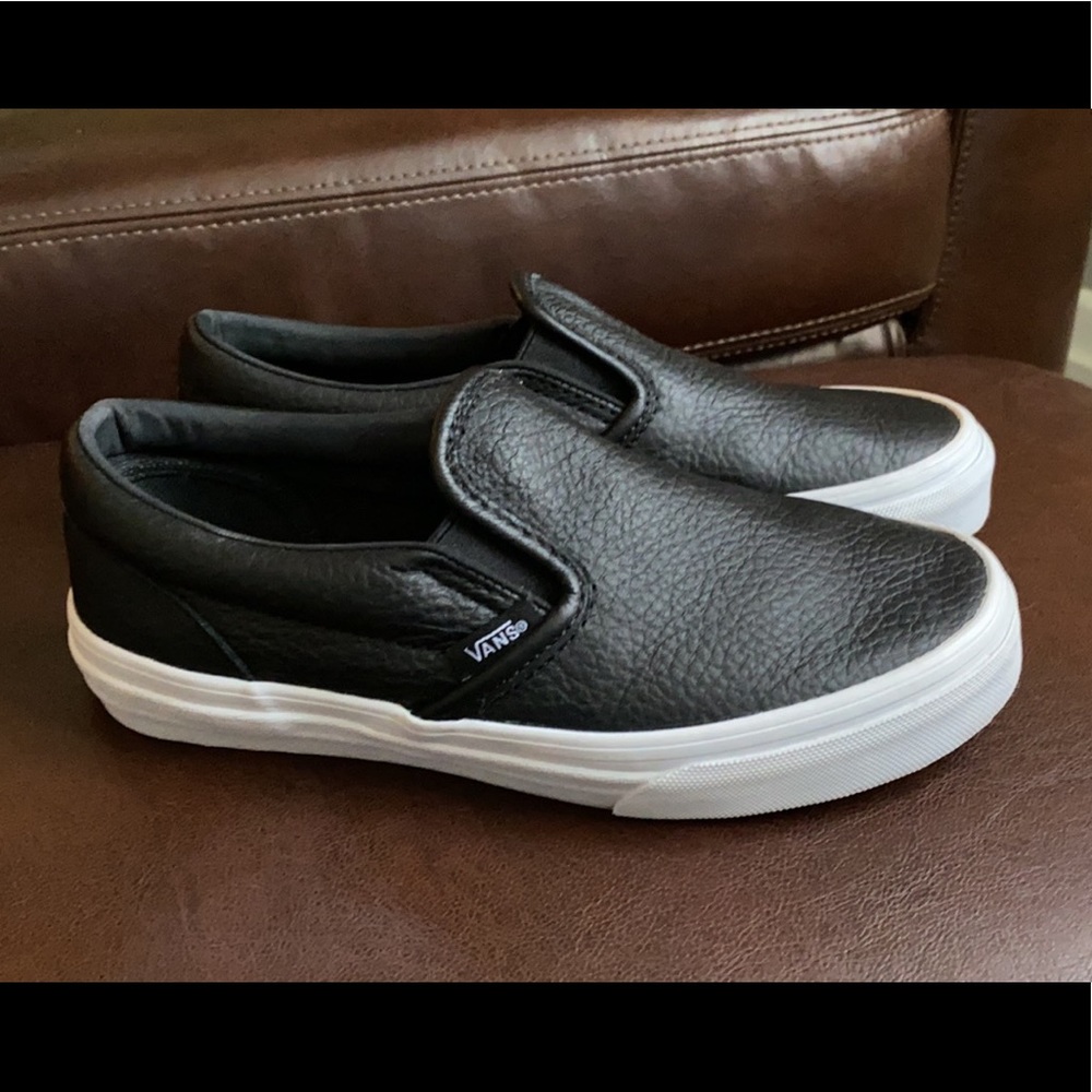 Kids black leather Vans. Barely worn.